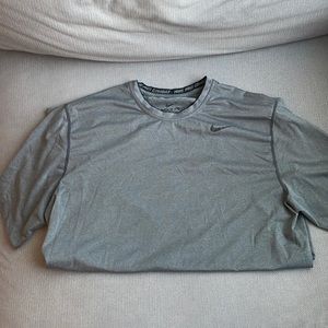 Gray Nike Pro Combat workout shirt